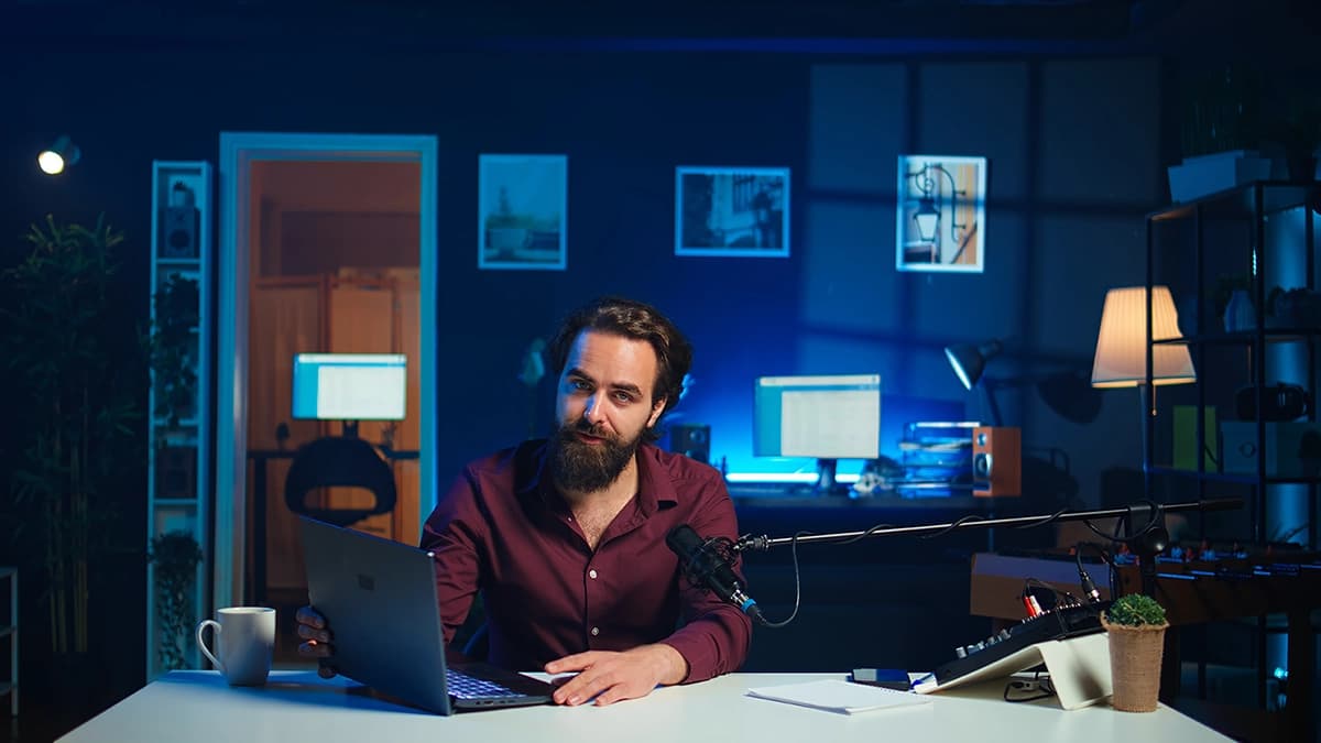 Designer reviewing ad creatives across multiple ad formats on screen.